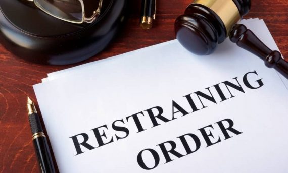 Restraining order and gavel.