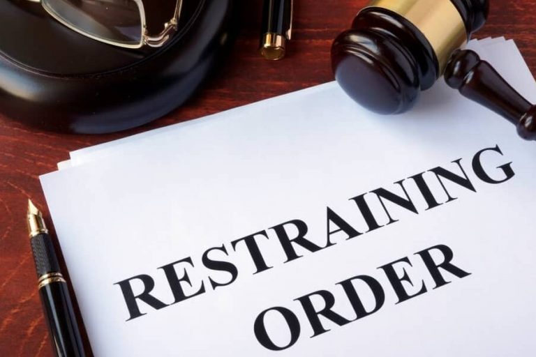 Restraining order and gavel.