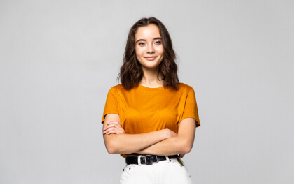 Portrait Beautiful Young Woman Standing Grey Wall